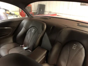 Custom interior of a 1957 Chevrolet 2-Door Hardtop with updated seats and clean upholstery