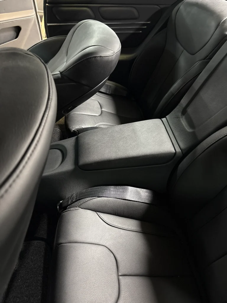 1967 Chevrolet Chevelle custom rear interior with black seats, center console, and clean upholstery
