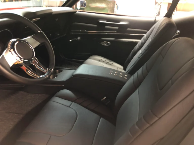 1973 Ford Mustang Mach 1 custom leather interior with stainless accents, power windows, and custom stereo system