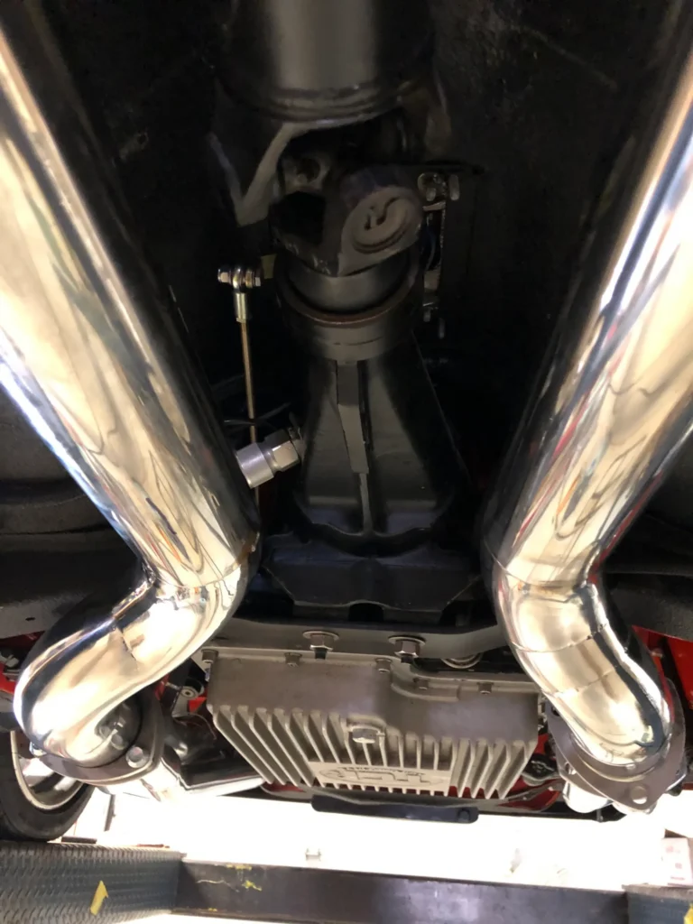 1973 Ford Mustang Mach 1 undercarriage with stainless exhaust, 9-inch Ford rear end, and restored drivetrain