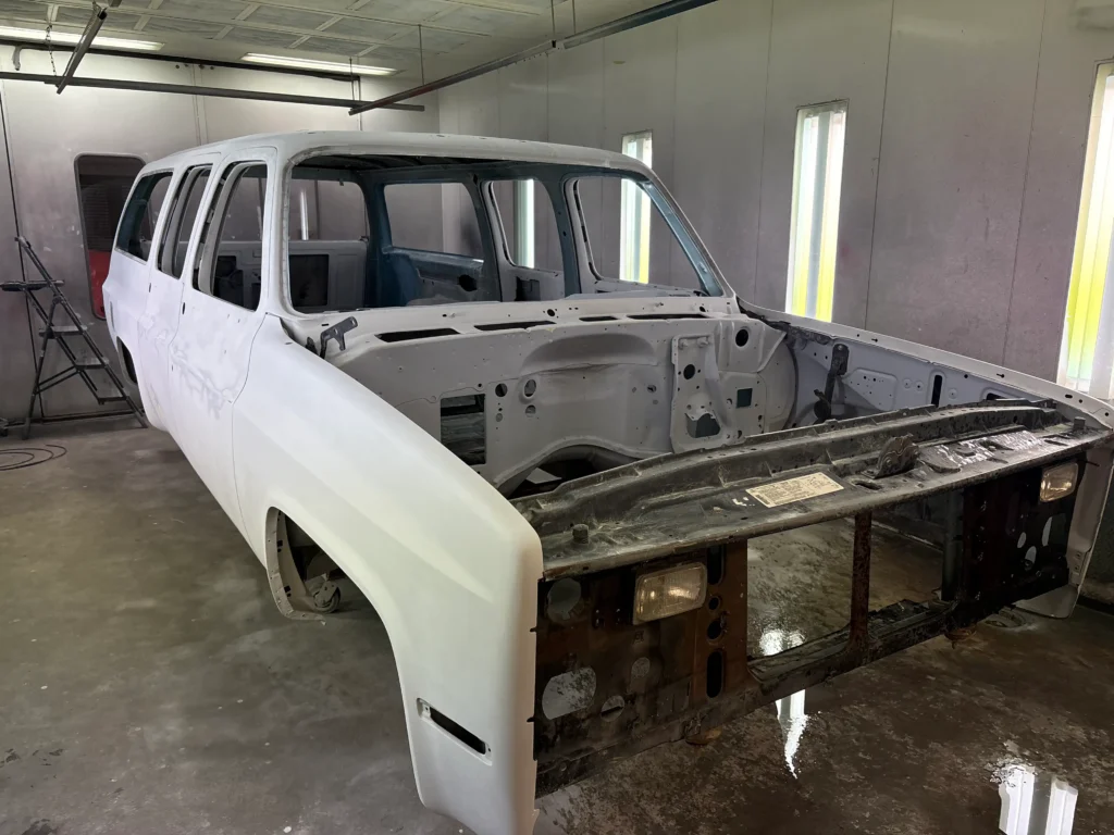 1991 Suburban full restoration with original body in primer during frame-off build stage