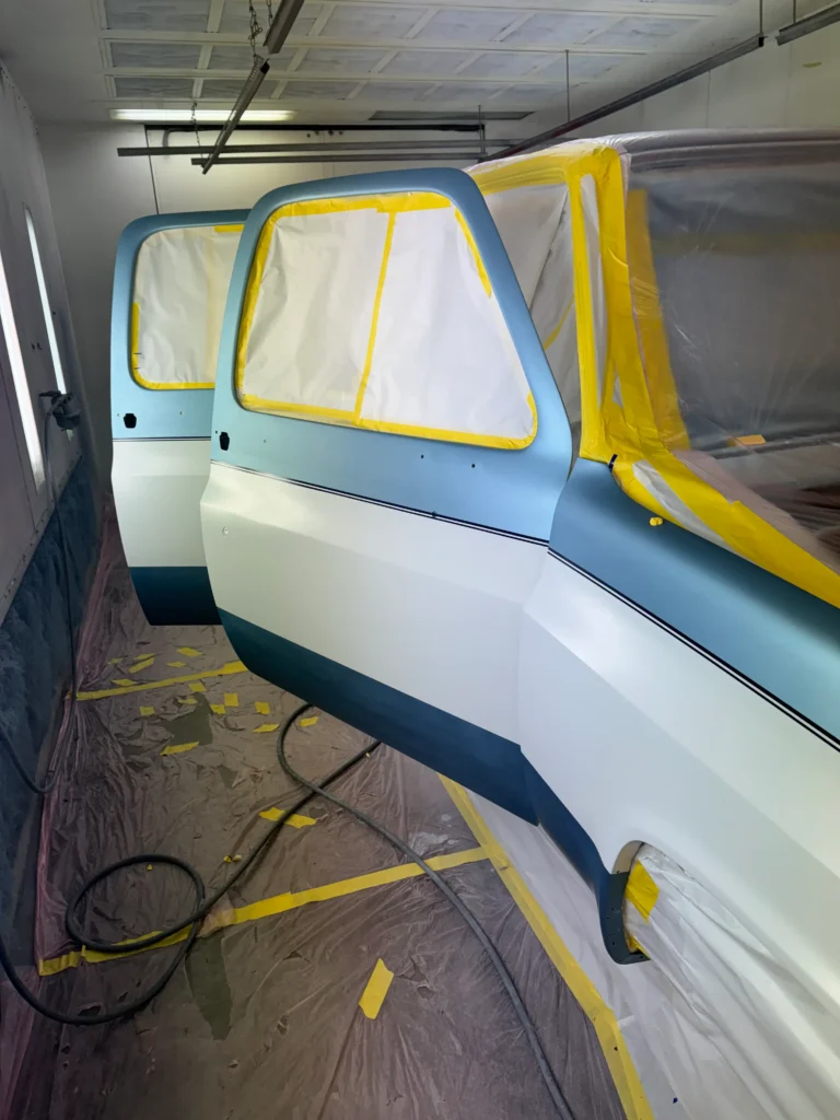 1991 Suburban full restoration with masked windows and fresh two-tone paint work in progress